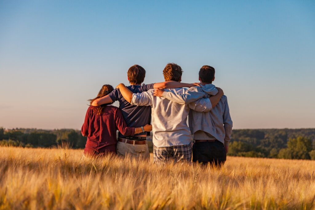 Group of friends standing side by side 