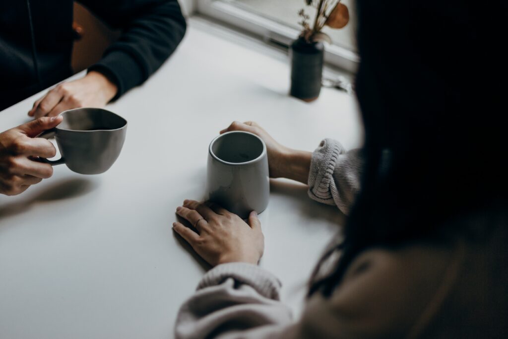 Two people having coffee 