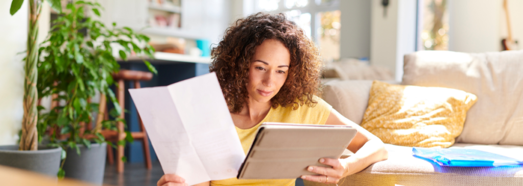 Woman reading through documents 