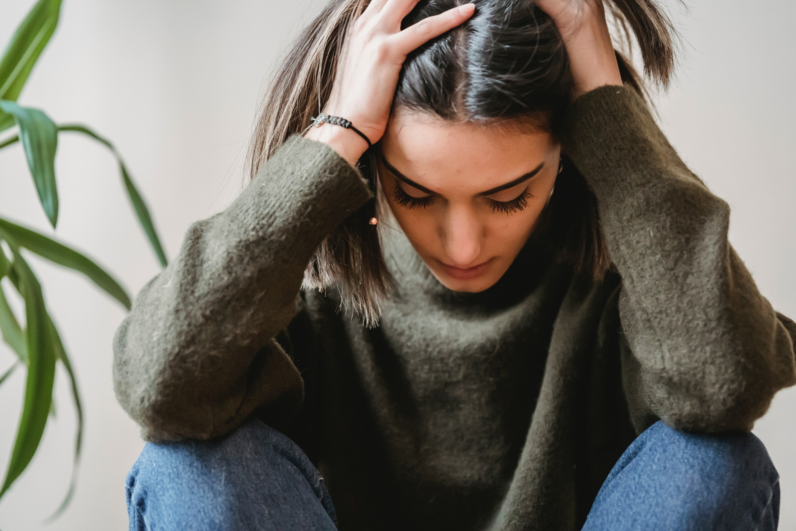 Young woman experiencing a panic attack 